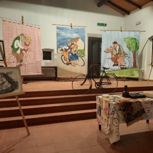  picture of the event: Al Cardello, per tutta l'estate, una mostra dedicata alla bicicletta, con disegni di Romano Buratti ed arazzi della Bottega Pascucci
